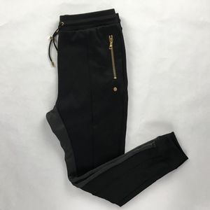 black and gold tracksuit mens